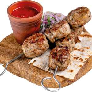 Люля-кебаб из баранины, запеченные в жировой сетке
